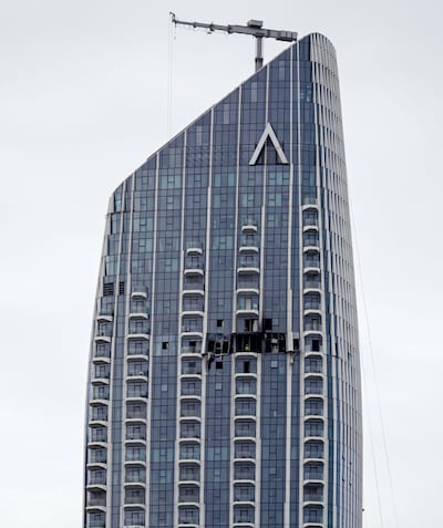 A damaged part of Dubai Creek Harbour Tower after it was hit by an Iranian drone. EPA