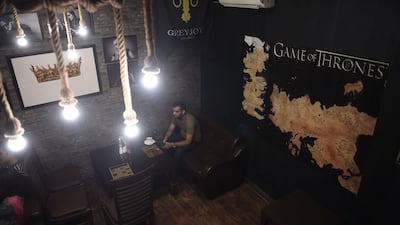Customer Haseeb Mahmood visits the Game Of Thrones-themed restaurant named King's Landing in Islamabad. Farooq Naeem / AFP