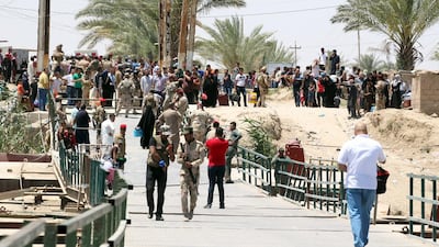 Residents from Ramadi who fled their homes as ISIL militants advanced. Sabah Arar / AFP
