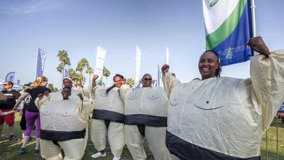 Triumphant "sumos" at the finish line for Dubai's inaugural Inflatathon.