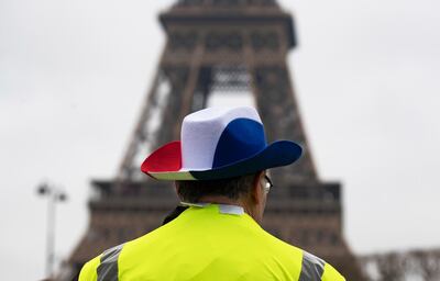 Protesters take part in a Women's 'Gilets Jaunes' (Yellow Vests) protest in front of the Eiffel Tower, in Paris, France, 20 January 2019. EPA