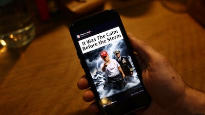 An Iranian looks at a social media post by US President Donald Trump in Tehran. Reuters