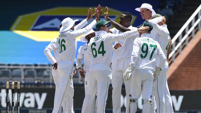 South Africa bowler Kagiso Rabada celebrates after claiming the wicket of Cheteshwar Pujara for 53. Getty