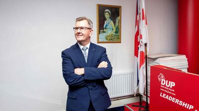 Democratic Unionist Party MP Jeffrey Donaldson poses for a photo at the party's headquarters. AFP