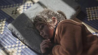 Tamam, 5, in Azraq, Jordan: Tamam is scared of her pillow and cries at night. The air raids on her hometown of Homs usually took place at night, and although she has been sleeping away from home for nearly two years, she still does not realise that her pillow is not the source of danger.