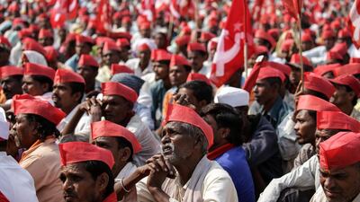 Farmers from Nasik listens to their leader during a protest rally in Mumbai, India. According to media reports, around 30,000 farmers began a protest march from Nasik to Mumbai, to protest outside the Maharashtra Assembly. Divyakant Solanki / EPA