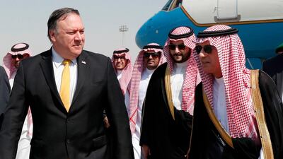US Secretary of State Mike Pompeo, left, walks alongside Saudi Foreign Minister Adel Al Jubeir after arriving in Riyadh, Saudi Arabia. AFP