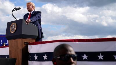 US President Donald Trump speaks during a campaign rally in Wisconsin. AP