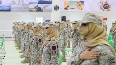The first batch of graduates from the Armed Forces Women's Cadre Training Centre take their oath at the passing out ceremony. They completed a 14-week basic training programme.