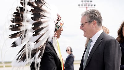 Keir Starmer is greeted by Bearspaw First Nation Chief Darcy Dixon at Calgary Airport in Canada, before the G7 leaders' summit in June 2025. PA