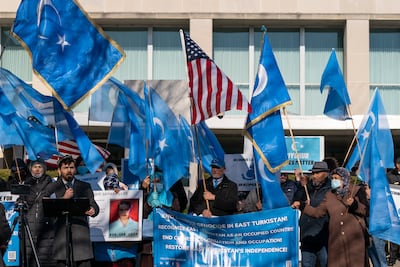 Members of the East Turkistan National Awakening Movement protest near the State Department this week against China's treatment of Uighurs. AP