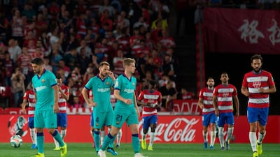 Barcelona players react to Granada's Nigerian midfielder Ramon Azeez's goal after only two minutes. AFP