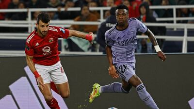 Real Madrid's Brazilian forward Vinicius Junior, right, is marked by Al Ahly's Egyptian defender Mahmoud Metwalli during the Fifa Club World Cup semi-final at the Prince Moulay Abdellah Stadium in Rabat on February 8, 2023. Real Madrid won the match 4-1. AFP