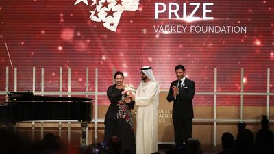 British teacher Andria Zafirakou receives the Global Teacher Prize from Sheikh Mohammed bin Rashid al-Maktoum, Vice-President and Prime Minister of the UAE and Ruler of Dubai AFP