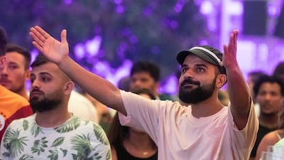 Fans of Manchester City and Inter Milan watch the game at Barasti in Dubai. Ruel Pableo for The National