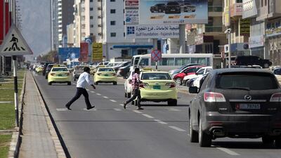One expert said that any roads where cars interact with pedestrians should have maximum speed limits of 30kph. Satish Kumar / The National