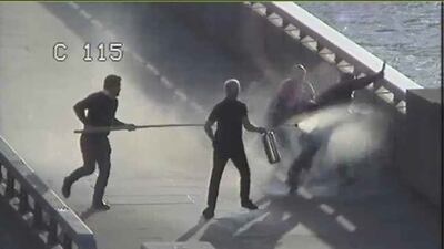 Usman Khan being confronted by Darryn Frost, Steven Gallant and John Crilly on London Bridge in 2019. Photo: Metropolitan Police