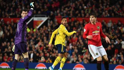 Arsenal's Gabonese striker Pierre-Emerick Aubameyang looks to the assistant referee after scoring. AFP