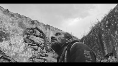 Fouad Mahouly as a mechanic in a scene from the film. Photo: Karim Kassem