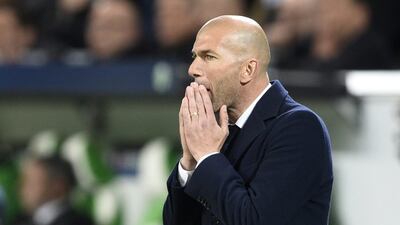 Real Madrid coach Zinedine Zidane looks dejected during his team's 2-0 loss to Wolfsburg in the Champions League on Wednesday night. Fabian Bimmer / Reuters / April 6, 2016