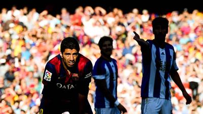 Luis Suarez of Barcelona looks on during the La Liga match against Real Sociedad on Saturday at the Camp Nou. David Ramos / Getty Images