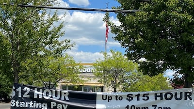 A banner inviting people to apply for jobs-outside a McDonald's in Bloomington, Indiana. Reuters