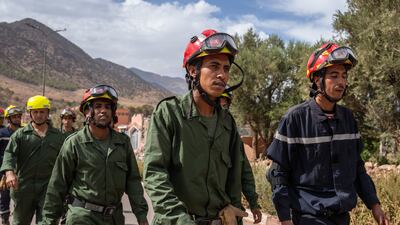Rescue workers in Talat N'Yaaqoub prepare to search for survivors. Getty Images