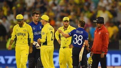 James Taylor talks to umpire Aleem Dar after he gave James Anderson out for a run-out. Shaun Botterill / Getty