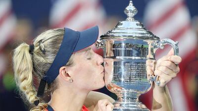 Angelique Kerber of Germany celebrates with the championship trophy after defeating Karolina Pliskova of the Czech Republic during the women’s final on Day 13 of the US Open. Justin Lane / EPA