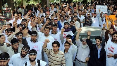 Iranian and Syrian students protest against Israel in front of the UN office in Tehran. Iran condemned Israel for its airstrikes on Syria and denied providing military support to the Assad regime.