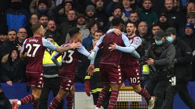 Aston Villa's Emiliano Buendia, right, celebrates scoring against Everton. PA