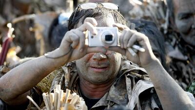 The village’s Taong Putik, or ‘Mud People’ festival, dates back to the Japanese occupation of the Philippines in the 1940s. Bullit Marquez / AP Photo