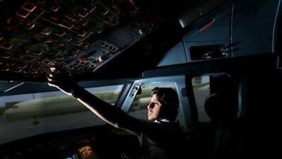 Abdullah Al Afifi, a cadet pilot at Etihad Airways, in an Airbus A320 simulator at the airline's flight training centre in Abu Dhabi. Sammy Dallal / The National