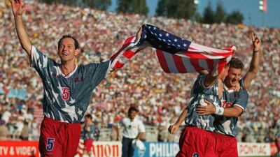 There were worries prior to the 1994 tournament that the United States would be the first host nation to not advance out of the Group stage, but with a 2-1 win over Colombia, Thomas Dooley, left, and his teammates reached the knockout round. Shaun Botterill / Allsport