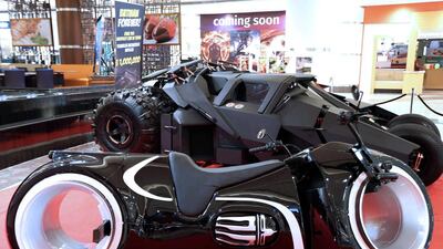 A Batmobile and bike used in one of the Batman movies on display at the Roaring Engines Like Never Before show in Sharjah. Pawan Singh / The National
