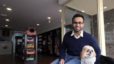 Hitesh Thawani, the owner of the Precious Paws Pet spa, offers massage services for pets in Dubai. Satish Kumar / The National