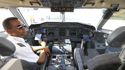 Ivory Coast's Air Côte d’Ivoire signed a conditional purchase agreement for two Q400 NextGen aircraft with options for two more aircraft. Above, inside the cockpit of a Q400 NextGen. Sarah Dea / The National