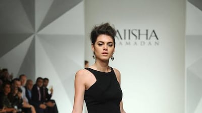 Aiisha Ramadan's satin skirt with the Dubai skyline embroidered along its hem. Stuart C Wilson / Getty Images for Fashion Forward