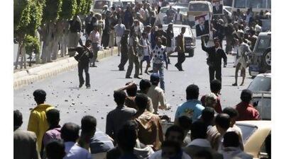 Protesters clash with government supporters in Sana'a at the weekend.