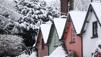 Rooftops are covered in snow in Keele. Reuters