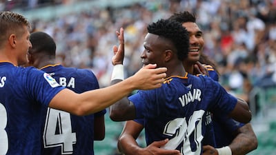 Vinicius Junior celebrates after his first. AFP