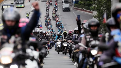 Members of Riders of the Philippines stage a motorcade to protest government policies on motorbikes, in Quezon City, east of Manila, Philippines. EPA