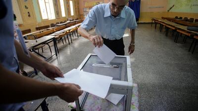 A man casts his vote at a polling station during the presidential election in Algiers. Reuters