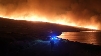 A wildfire burns near the town of Alacati, in Turkey's Izmir province. Reuters