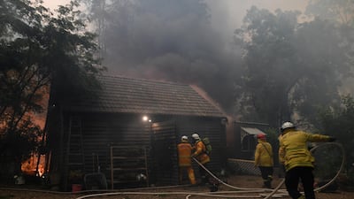 NSW Rural Fire Service crews fight the Gospers Mountain Fire as it impacts property at Bilpin, in the Blue Mountains, west of Sydney, Australia, 21 December 2019. EPA