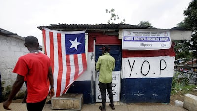 The Liberian national flag on a booth in Monrovia. EPA