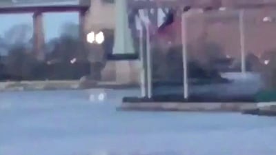 The helicopter crashed in New York City's East River. John Magers / via Reuters