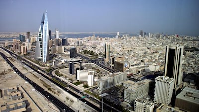 A high-rise view of Manama and the Bahrain World Trade Centre Tower as seen from Bahrain Financial Harbour. Razan Alzayani / The National