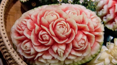 A carved watermelon is displayed during a fruit and vegetable carving competition in Bangkok. Robert Schmidt / AFP