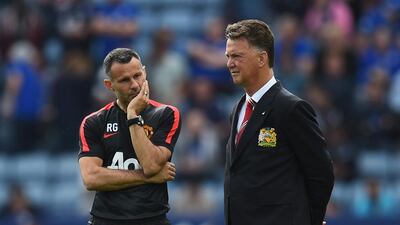 Louis van Gaal, right, says he has a good relationship with Ryan Giggs, left, and the rest of his staff and playersat Manchester United. Mike Hewitt / Getty Images
